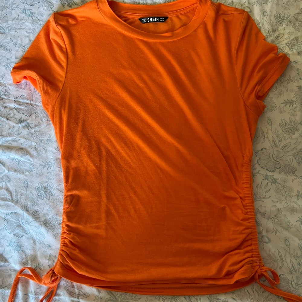 Orange drawstring shirt
